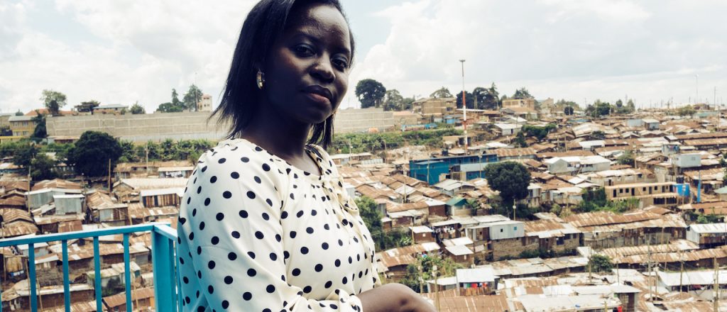 Josephine Miliza of the Tunapanda Institute with on a balcony at St Christine school in the slum community of Kibera