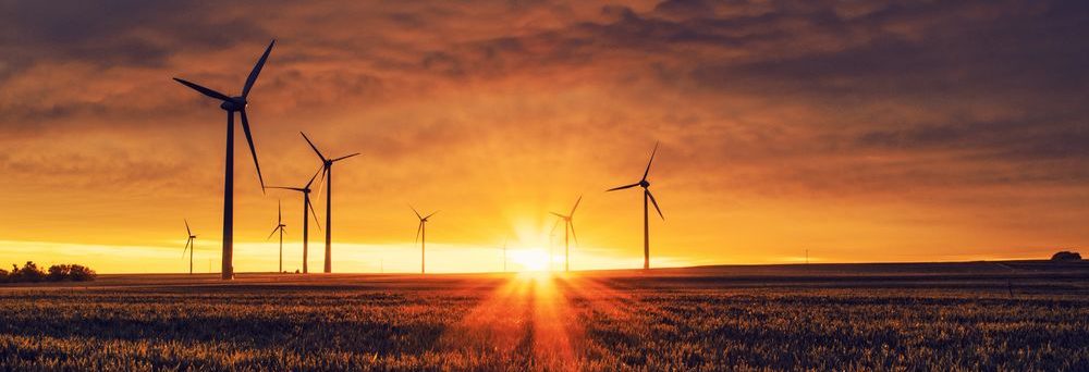 Wind turbines at sunset