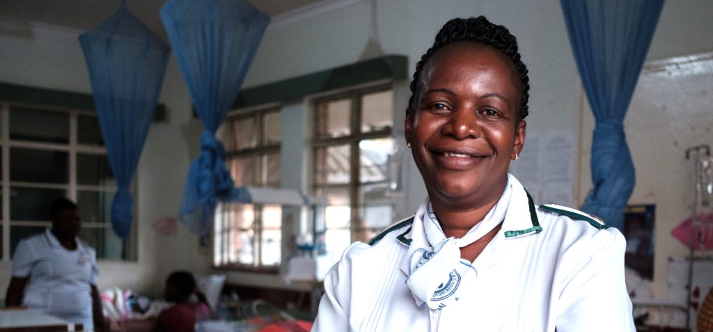 A nurse stands in a hospital ward in Murambinda, Zimbabwe