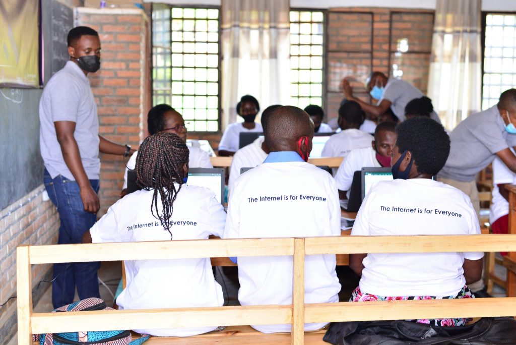 isoc_rwanda_project Students in a classroom, wearing The Internet is for Everyone t-shirts