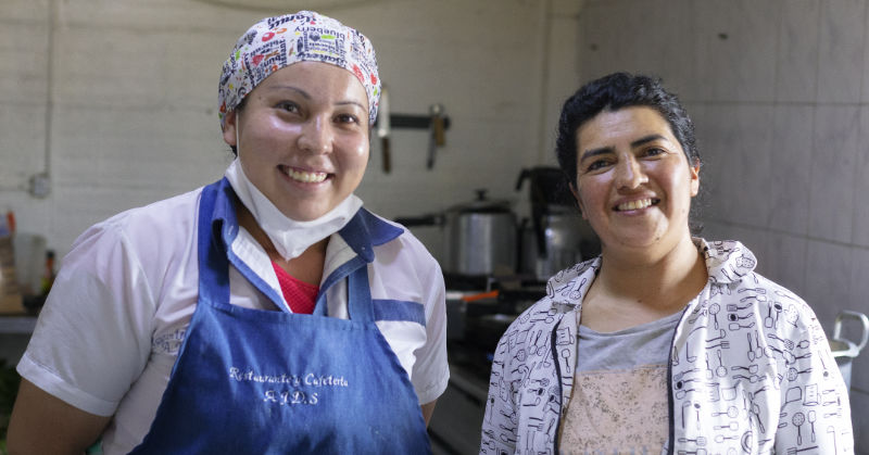 Two women working in a bakery