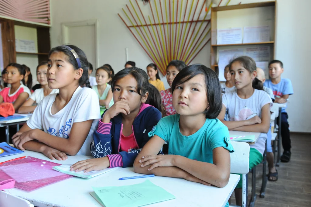 Jalal-Abad region / Kyrgyzstan - 06.25.2018 : Children in the classroom in a rural school