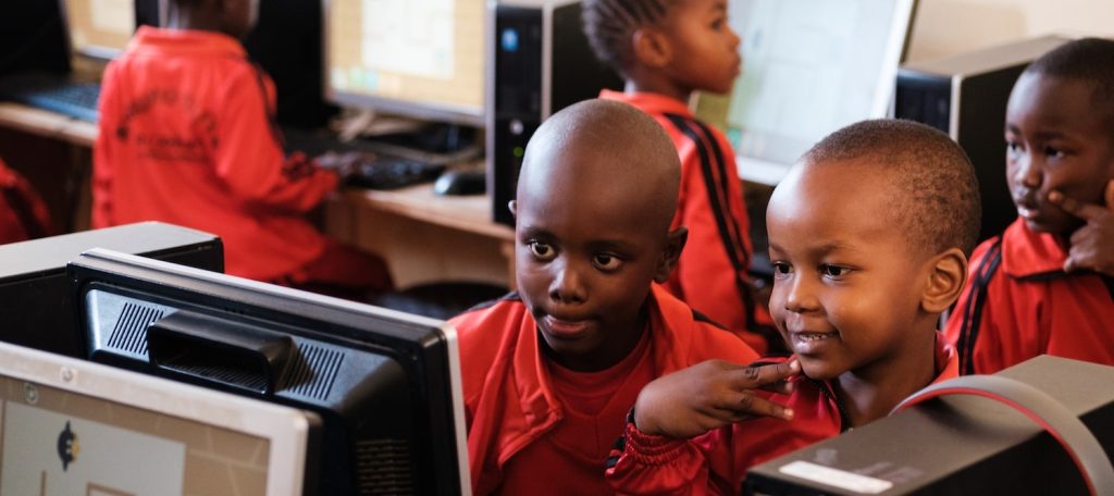 Kids in front of a computer