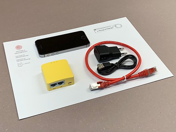 Image of a mobile phone and cables.