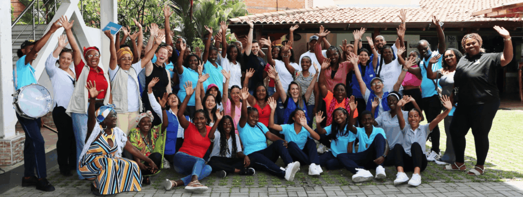 A group of beneficiaries from a grant program is celebrating.