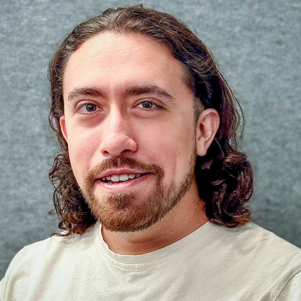 Headshot of Joseph Dickens.