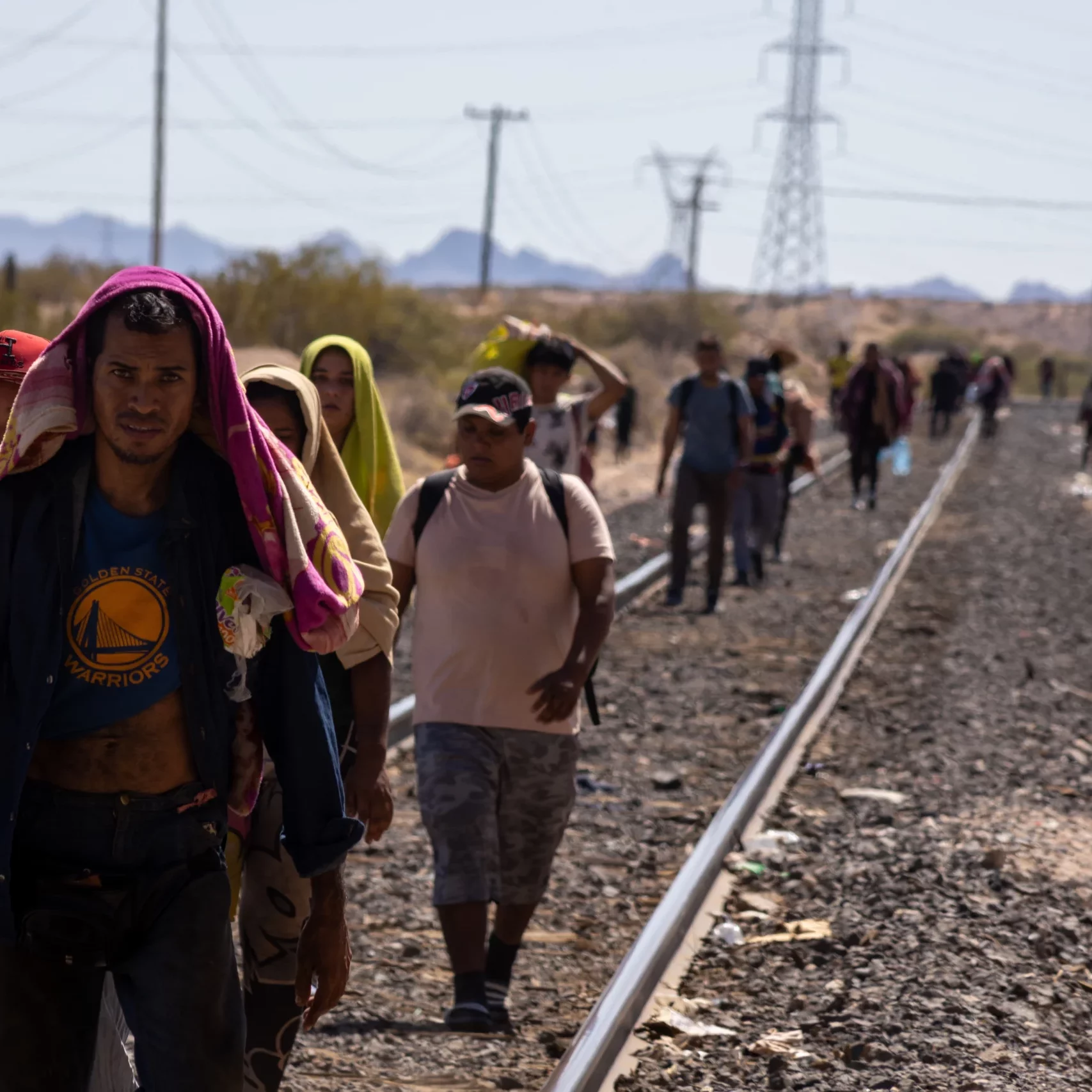Migrants Walk Alongside the Railroad Tracks After Dismounting from the 'La Bestia' Train, Which They Rode Through Mexico to Reach the Mexico-U.S. Border - Chihuahua, Mexico