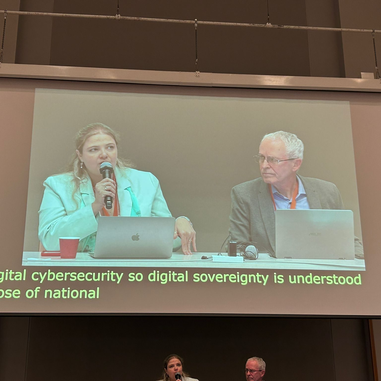 Project members making a presentation at a conference